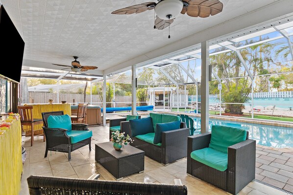Outdoor dining - Seminole Beach Retreat! 8 Beds, Huge Heated Pool, 2 miles to Indian Rocks Beach! (Seminole)