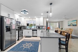 Fridge, microwave, oven, stovetop - Seminole Beach Retreat! 8 Beds, Huge Heated Pool, 2 miles to Indian Rocks Beach! (Seminole)