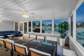 Outdoor dining - Waterfront Escape: 5Bed, 3Bath, Heated Pool! (Tampa, FL 33615)