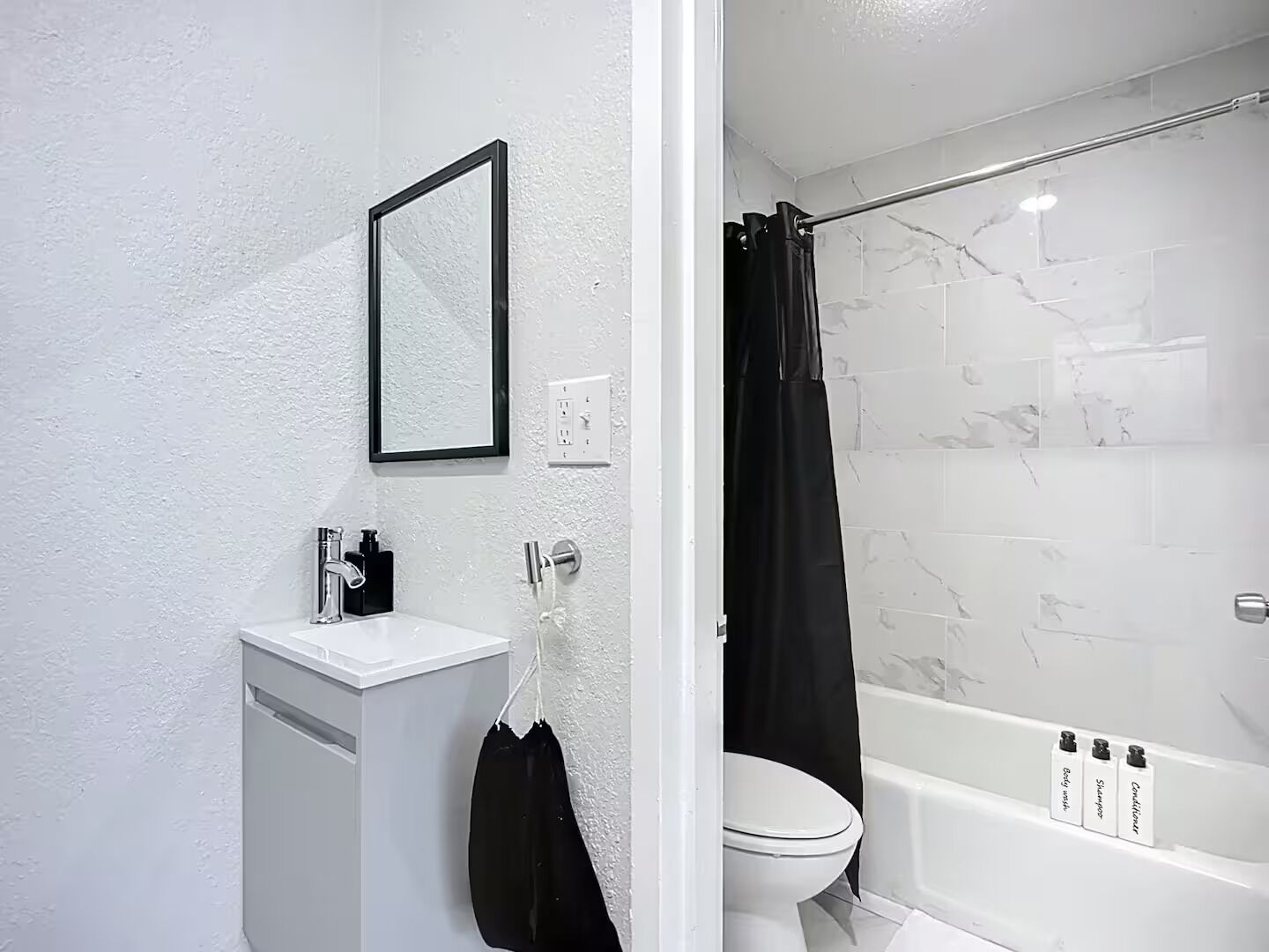 Hair dryer, towels, soap, toilet paper