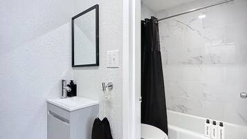 Hair dryer, towels, soap, toilet paper