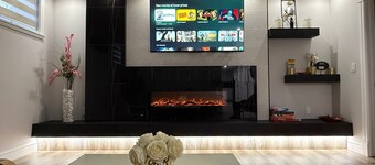 Executive 3BR Suite with upgrades and a separate entrance. Sleeps 8. Well-stocked, high-end kitchen. Pet friendly.