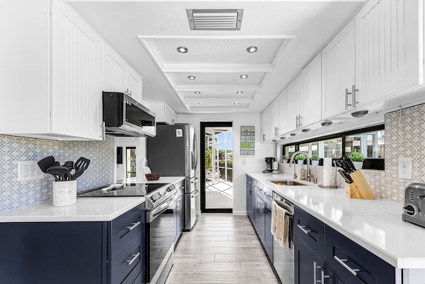 Private kitchen - Waterfront Retreat: Charming 2-BR Home w/ AC, Dock & Peaceful. (Saint James City)