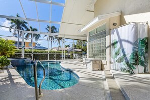 Pool - Waterfront Retreat: Charming 2-BR Home w/ AC, Dock & Peaceful. (Saint James City)