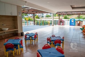 Apartment | Outdoor dining - Beach Class Muro Alto Resort (Ipojuca)