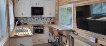 Tiny home in Van Alstyne with easy access to Hwy 75 and exceptional privacy.