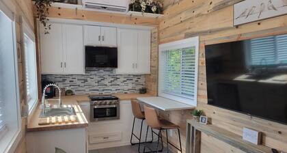 Tiny home in Van Alstyne with easy access to Hwy 75 and exceptional privacy.