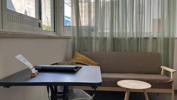 Double Room, Courtyard View | Living area | 32-inch LED TV with digital channels