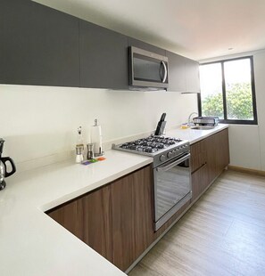 Private kitchen - Modern Apartment, this beautiful apartment located in the heart of La Condesa (Ciudad de México)