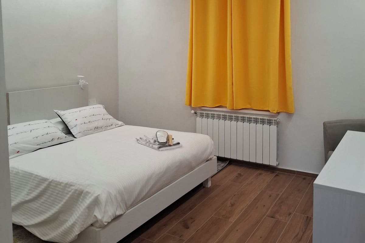 Deluxe appartement, uitzicht op tuin | Verduisterende gordijnen, een strijkplank/strijkijzer, gratis wifi