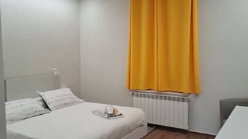 Deluxe Apartment, Garden View | Blackout drapes, iron/ironing board, free WiFi
