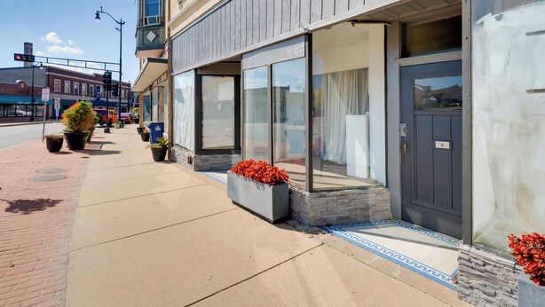 A hotel with a modern facade, large windows, and a welcoming entrance. - Walkable Racine Retreat! 1 Mi to Lake Michigan (Racine)
