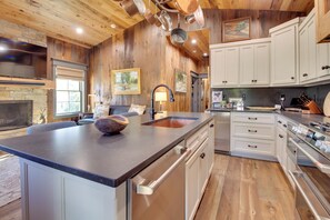 Fridge, microwave, stovetop, dishwasher - Walk to White River: Cozy Escape w/ Screened Porch (Cotter)