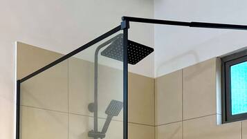 Shower, hair dryer, towels, soap