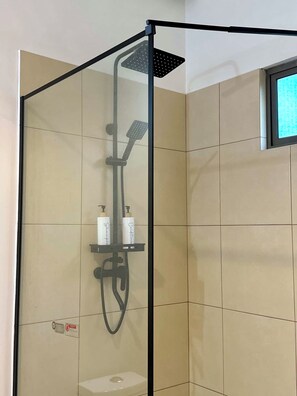 Shower, hair dryer, towels, soap