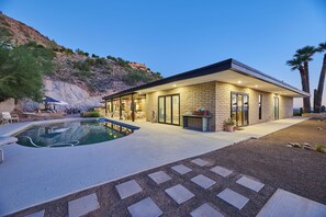 A modern house with a swimming pool, patio, and a view of a hill. - Paradise Valley Private Hilltop Estate--Entertainers Dream (Paradise Valley)