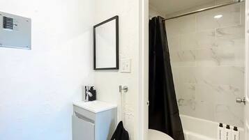 Hair dryer, towels, soap, toilet paper