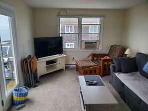 Living area - On Minot Beach -  1-bedroom apartment with deck and views of the ocean (Scituate)