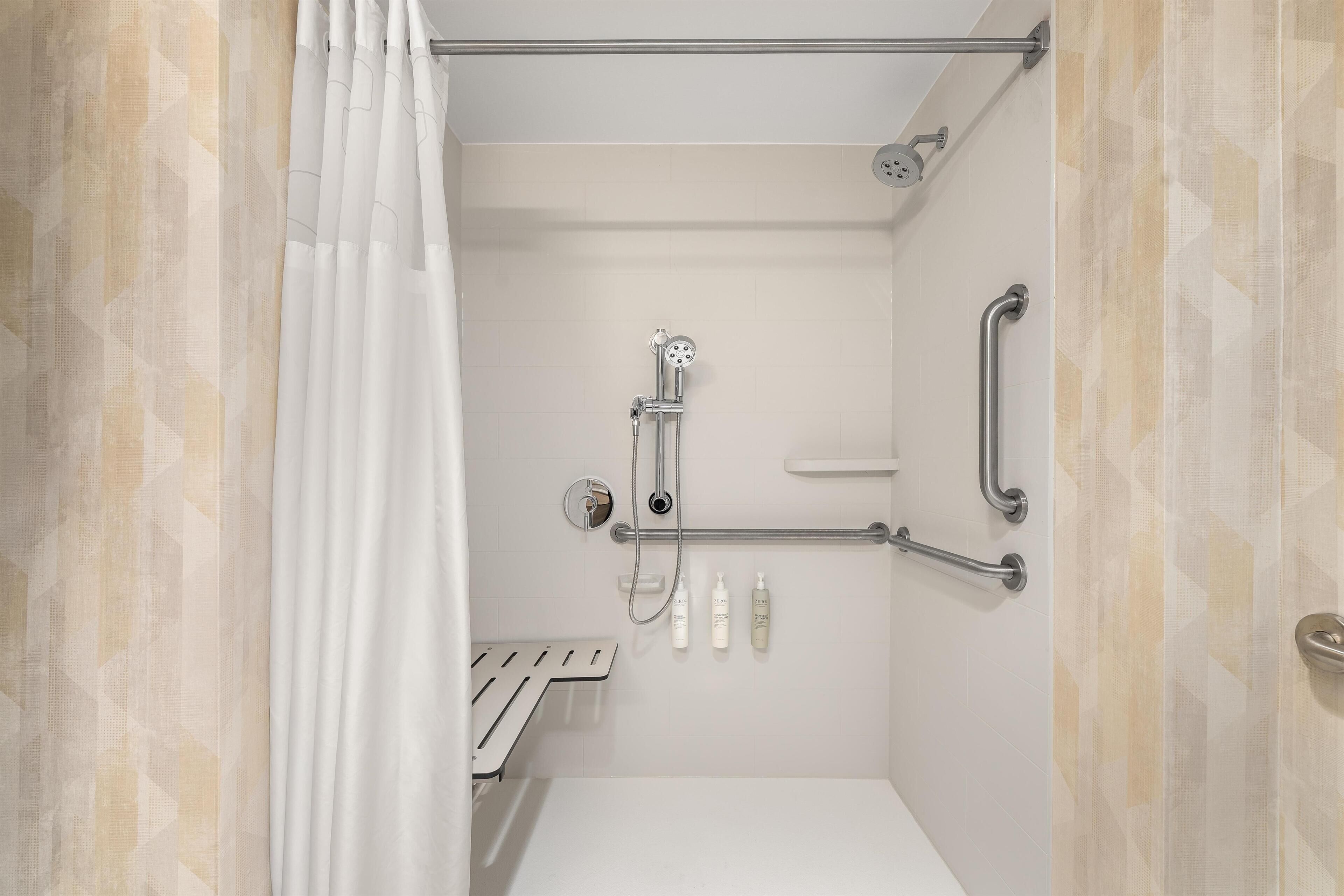 Room, 1 King Bed, Accessible (Roll-In Shower) | Bathroom shower