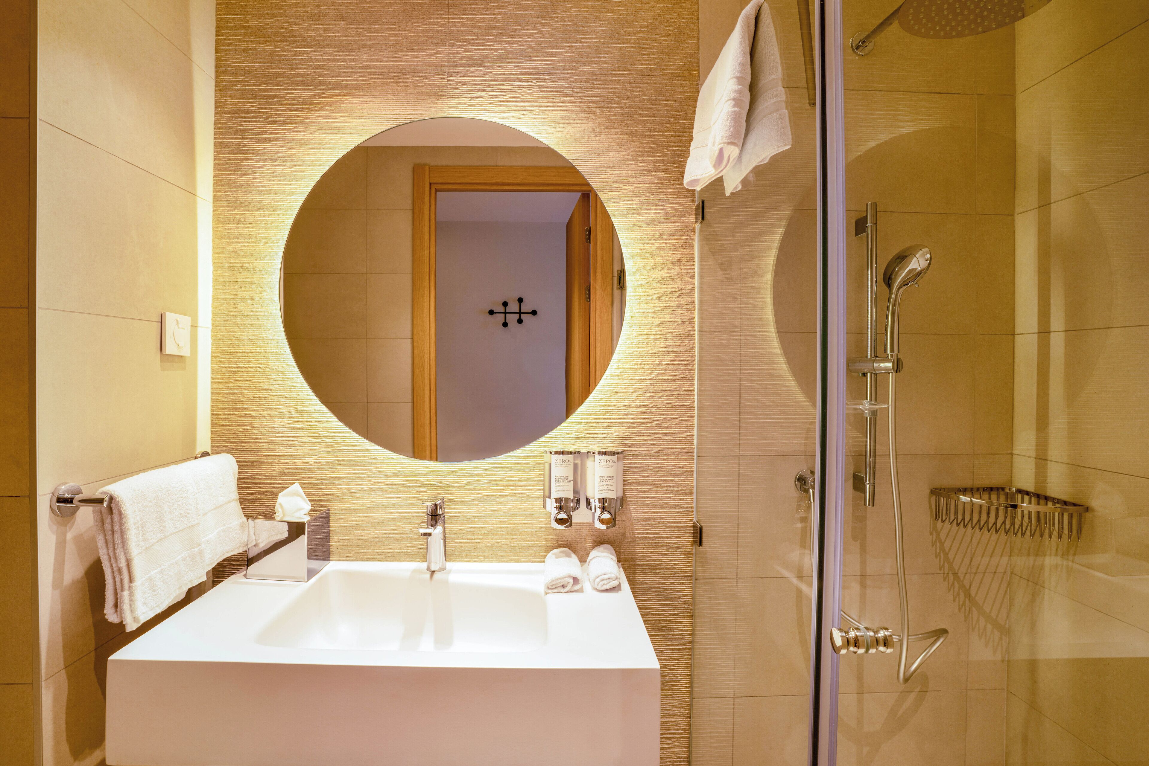 Rainfall showerhead, towels, soap, shampoo