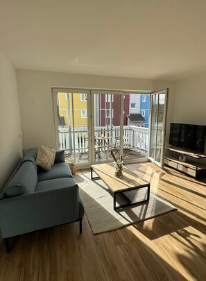 Living area - Design City Apartment Casper at the marina (Greifswald)