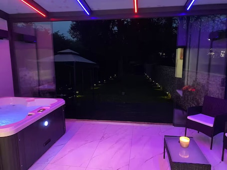 Outdoor spa tub. Private luxury suite on 2 levels