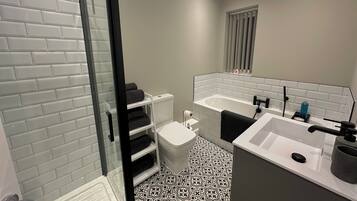 Hair dryer, towels, soap, toilet paper