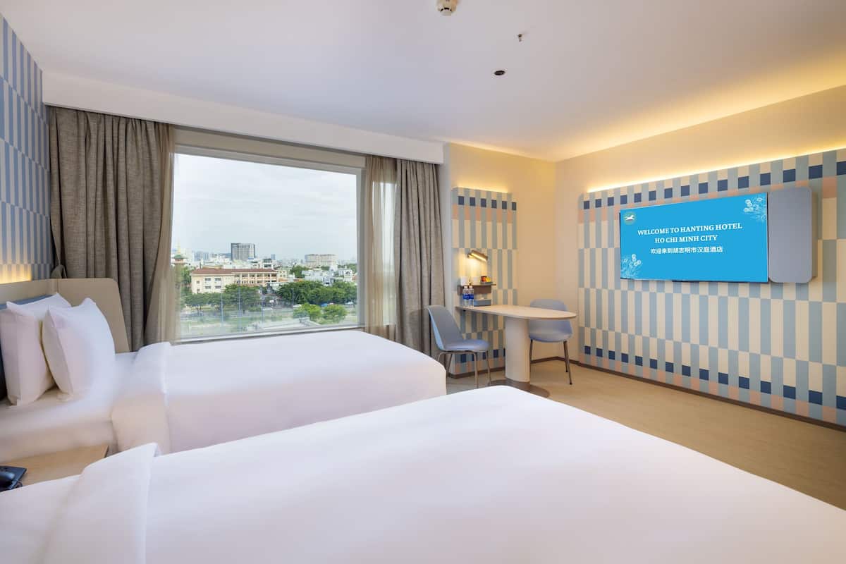 Luxury Studio Suite, City View | In-room safe, desk, blackout drapes, soundproofing