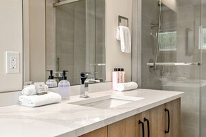 Shower, hair dryer, towels, soap - Bnew 2BR in DT Golden | AC, Balcony, BBQ, Sleeps 6 (Golden)