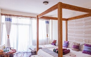 Family Room, Balcony, City View | Free WiFi