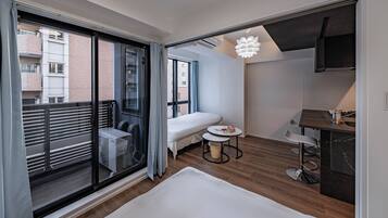 Superior Quadruple Room, Balcony, City View | Laptop workspace, blackout drapes, soundproofing, iron/ironing board