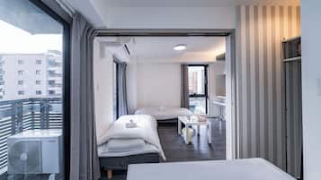 Superior Quadruple Room, Balcony, City View | Laptop workspace, blackout drapes, soundproofing, iron/ironing board