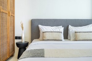 Desk, laptop workspace, iron/ironing board, cribs/infant beds