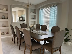 Dining - Serene 6 bedroom villa in Emerald Island resort w/pool, minutes from Disney! (Kissimmee)