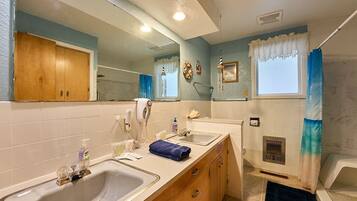 Hair dryer, towels, soap, shampoo