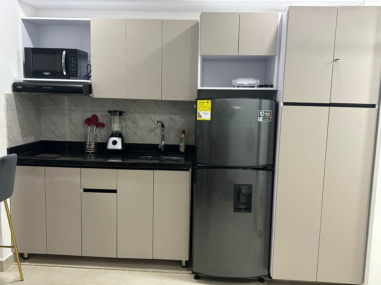 Fridge, microwave, stovetop, coffee/tea maker