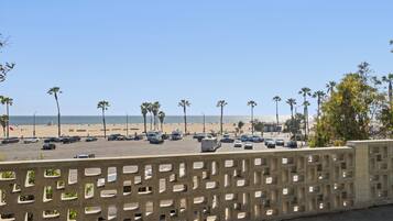 On the beach, sun loungers, beach towels