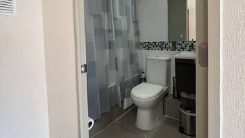 Hair dryer, towels, soap, toilet paper