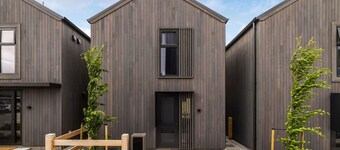 A modern 2-bedroom retreat in the popular Five Mile Villas.