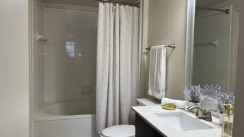 Hair dryer, towels, soap, shampoo