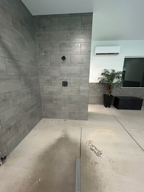 Shower, towels, soap, toilet paper