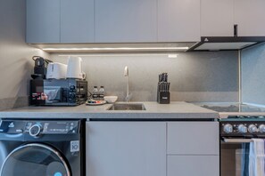 Deluxe Studio, Balcony, City View | Private kitchen - MAG 970 Residences - MBR (Dubai)