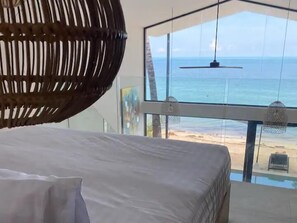 2 dormitorios, tabla de planchar con plancha, ropa de cama
