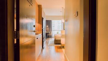 Comfort Suite, City View | In-room safe, desk, laptop workspace, blackout drapes