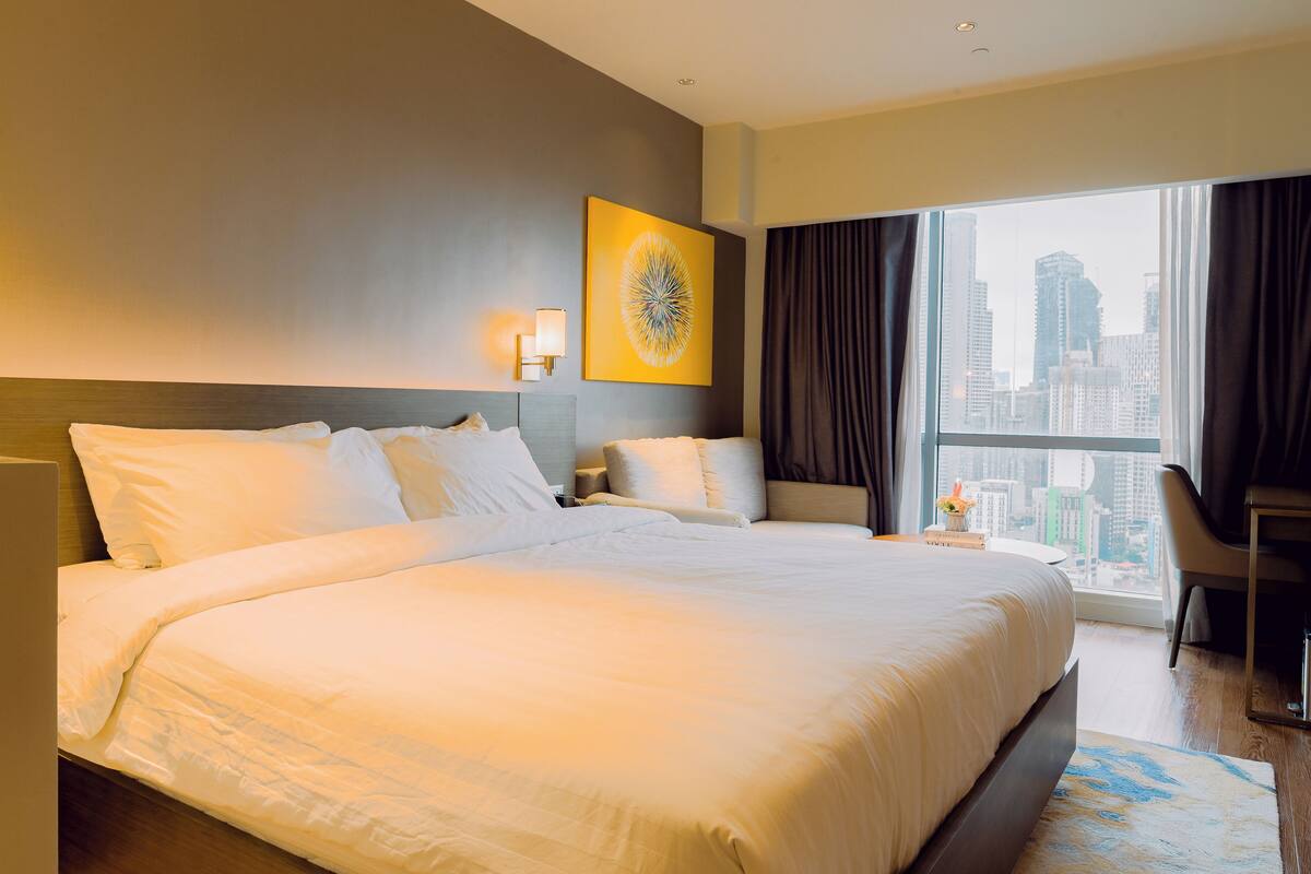 In-room safe, desk, laptop workspace, blackout curtains