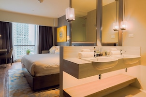 Comfort Suite, City View | In-room safe, desk, laptop workspace, blackout drapes
