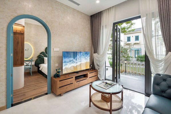 Economy Room | Living area | TV - SURI VILLA (Phan Thiet)