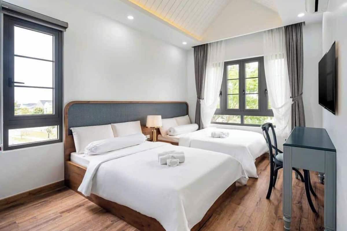 Camera Basic con 2 letti singoli | Una scrivania, postazione laptop, Wi-Fi gratuito, lenzuola