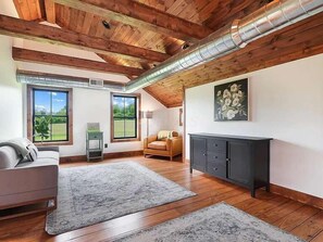 TV, fireplace - The Elysian Retreat S (Granville)