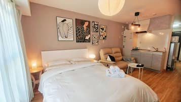 Deluxe Studio, Balcony, City View | Desk, laptop workspace, iron/ironing board, free WiFi